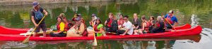 PDT Climate Champions and volunteers on a boat on the Grand Union Canal
